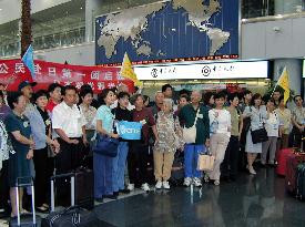 1st Chinese holiday tour group heads for Japan